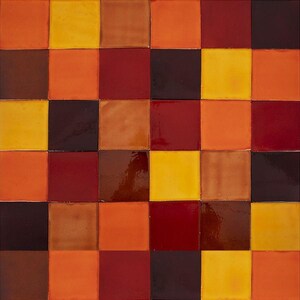 May include: A square tile mosaic with a checkerboard pattern in shades of orange, red, brown, and yellow.