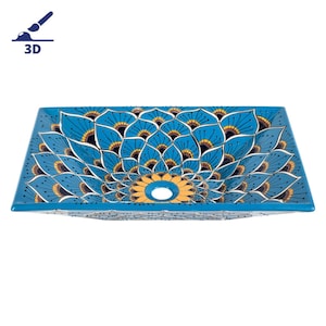 Op de afbeelding: Een rechthoekige keramische wastafel met een blauw, geel en zwart pauwenverenontwerp. De wastafel heeft een rond afvoergat in het midden.