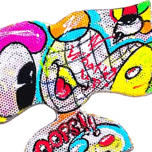 May include: A colorful abstract art piece with a white background and a black and white eye in the lower left corner. The art piece is made of a mesh material and has a variety of colors, including red, yellow, blue, green, and pink. The art piece also has a variety of shapes, including circles, squares, and triangles. The art piece is signed "Doors!" in the lower right corner.