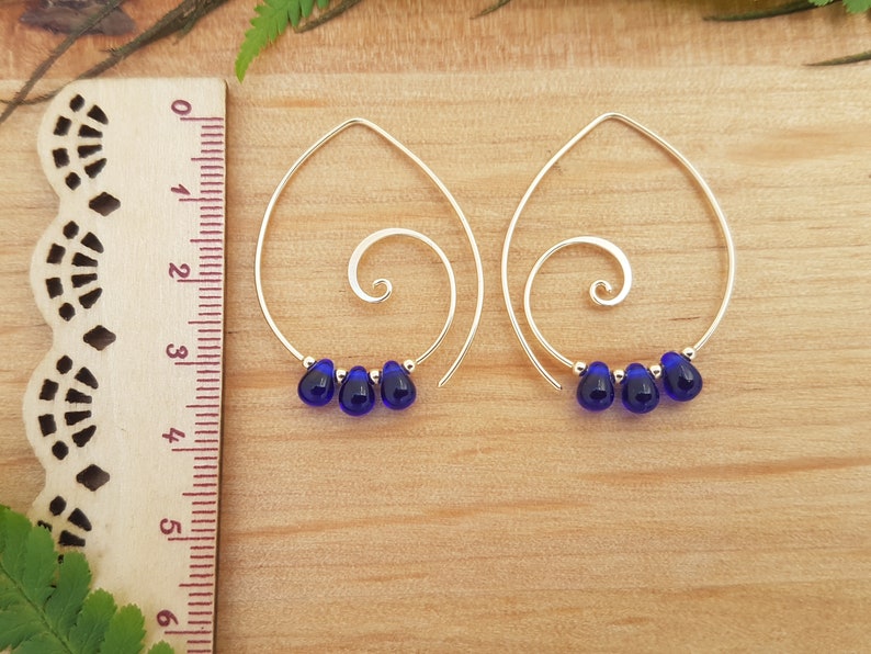 Gold Spiral Earrings with Cobalt Blue Glass Teardrop beads Cheeky Danglers Spiral Jewellery Handcrafted Earrings Spiral Hoop Earrings