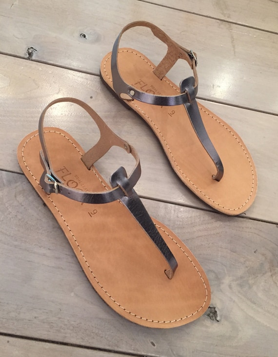 Guess Women's Jiarella Flat T Strap Hardware Accent Sandals - Silver -  Manmade - Yahoo Shopping