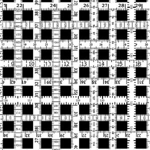 May include: A black and white ruler with numbered markings. The ruler is divided into squares, with each square measuring 1 inch. The ruler is a useful tool for measuring and drawing.