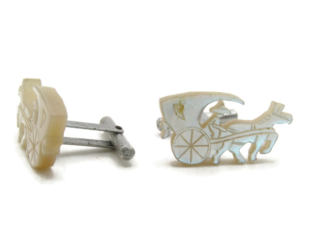 Paire de boutons de manchettes Navette en or 18K (750/oo) poinçon