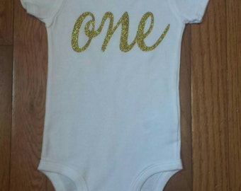 SALE Ships out fast Gold Glitter Vinyl Bling "ONE" Onesie, infant, toddler, baby girl, 1st Birthday, Photo Prop, Cake Smash Set