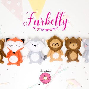 May include: A set of seven felt animal toys, including a monkey, fox, wolf, lion, bear, and koala. The toys are all brown, orange, gray, tan, and gray. The toys are arranged in a row on a white background. The text "Furbelly" is written in pink above the toys.