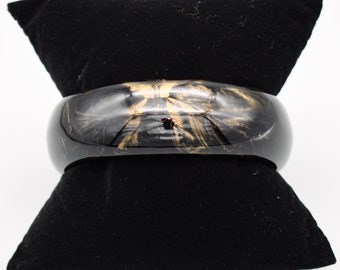 Mod 60's swirled gold in black lucite chunky bangle, dark plastic metallic highlights bracelet