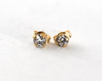 90's Jacmel Mauritius tiny 10k gold cubic zirconia studs, clear CZs yellow gold JCM minimalist bling earrings
