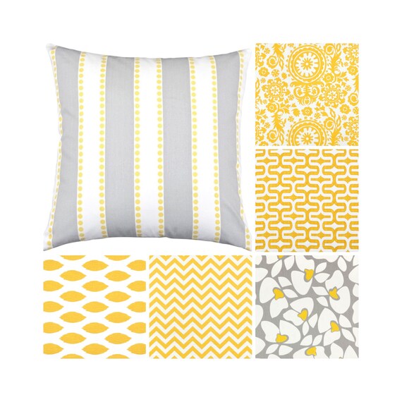 yellow and gray throw pillows