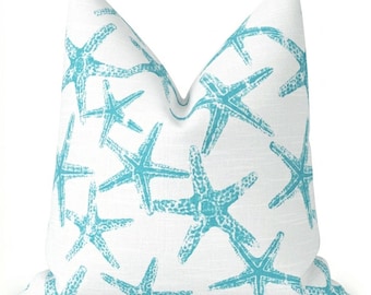 Kustblauwe kussens. Kusthuisdecor. Zeester kussens. Decoratieve kussens strandhuis. Kussenslopen lichtblauw accent