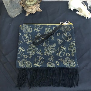 Snakes and Skulls Fringe Clutch
