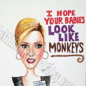 May include: A hand-drawn caricature of a woman with blonde hair, wearing a black blazer and a name tag that reads "Michele Weinberger". The text "I hope your babies look like monkeys" is written in red, purple, and brown lettering.
