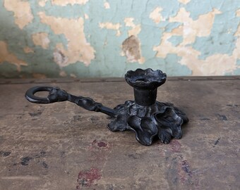 Vintage cast iron candlestick holder