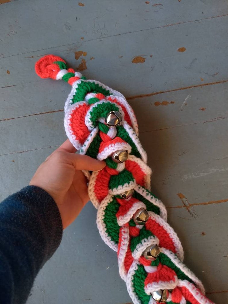 Vintage yarn and jingle bell door hanger