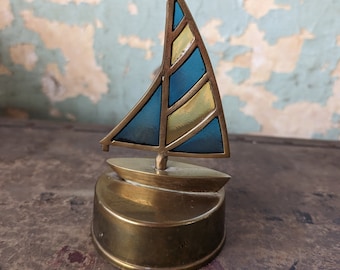 Vintage brass sailboat paperweight