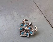 Vintage 1970s faux turquoise Native American Kachina doll bull pin
