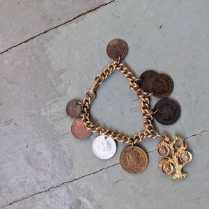 Vintage coins of the world charm bracelet