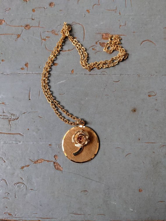 Vintage 10 karat gold rose pendant