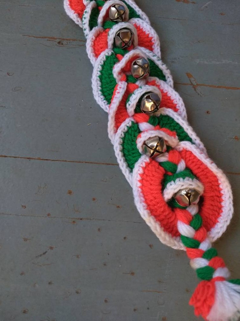 Vintage yarn and jingle bell door hanger
