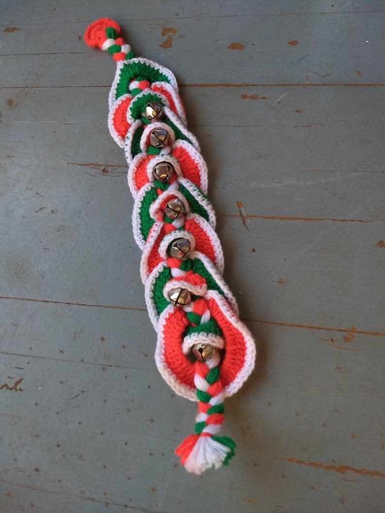 Vintage yarn and jingle bell door hanger