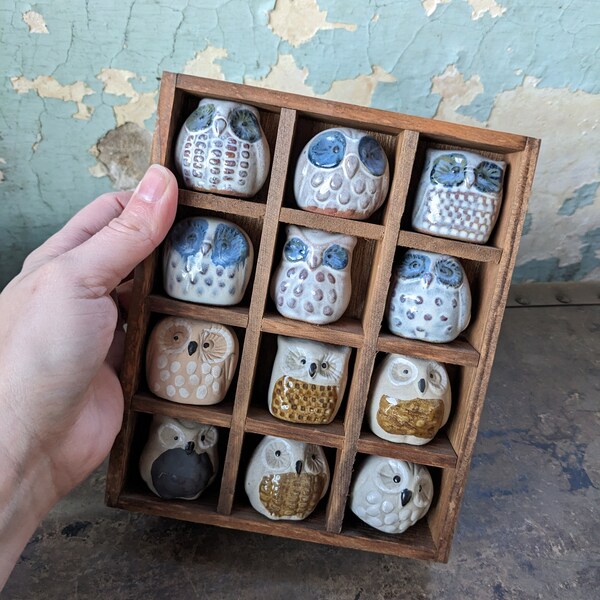 Vintage handmade terracotta owl figurine collection