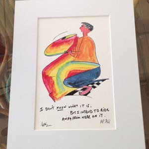 May include: A colorful cartoon illustration of a person riding a rainbow-colored object. The text in the image reads: "I don't know what it is. But I intend to ride away from here on it. AP3/36"