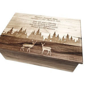 a wooden box with a picture of two deers