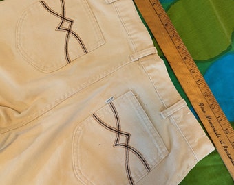 Super seventies Levi's tan boot cuts with a fancy pockets