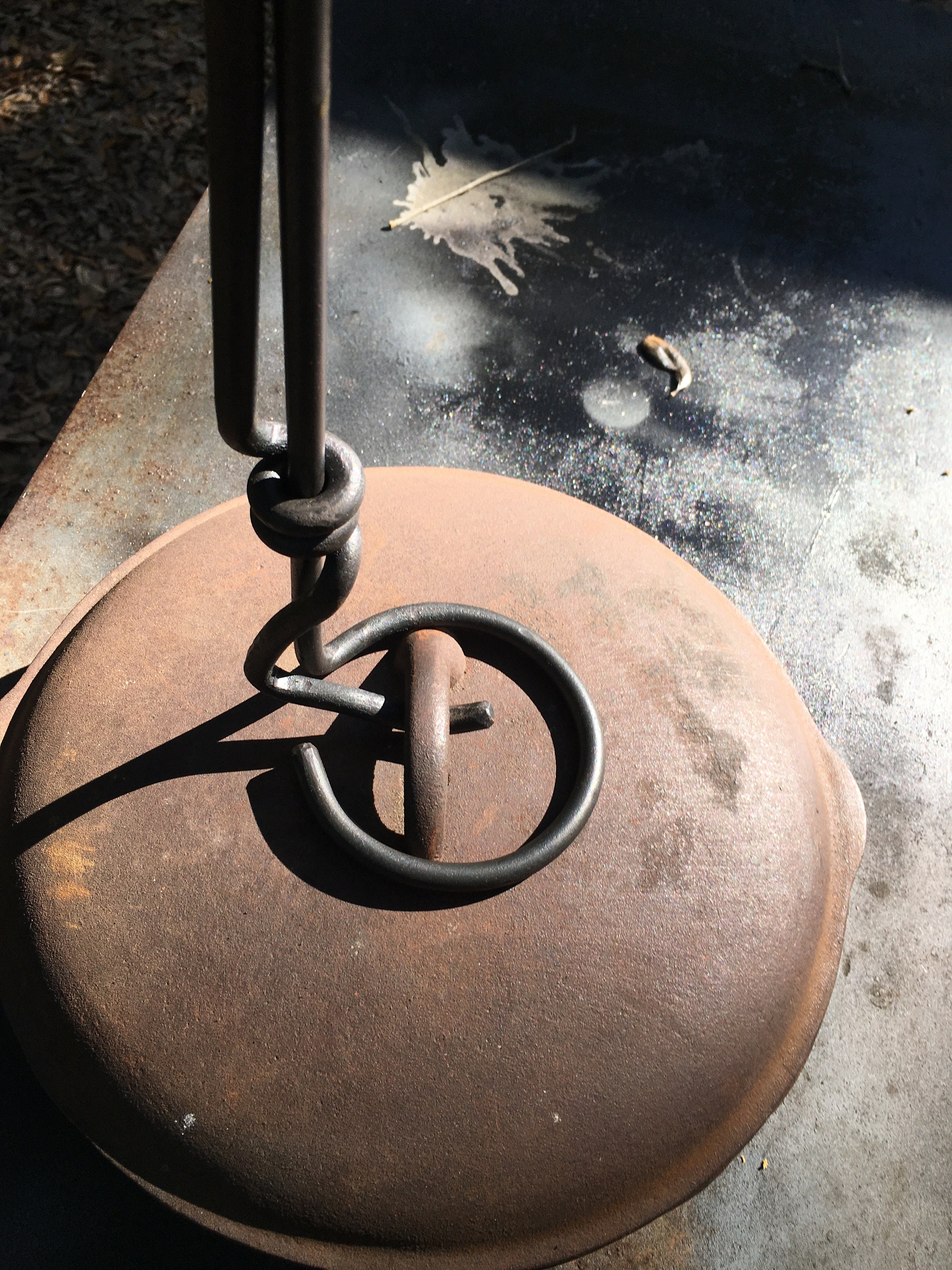 Dutch Oven Lid Lifter for Outdoor Campfire Cooking. the Lid Shown is for a  Standard Cast Iron Pot and is Not Included. 