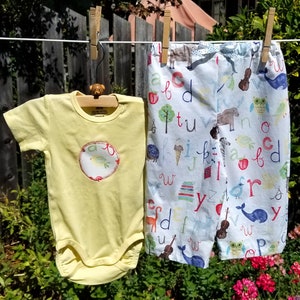 Baby Set with ABC Animal Print Pants and Yellow Bodysuit. 4-6 M or 6-9 M