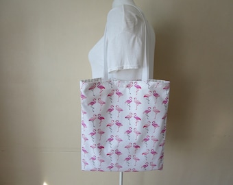 Tote bag, sac, en tissu de couleur blanche avec des flamands roses