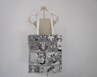 Tote bag, sac, en tissu de couleur noire, grise et blanche motif bande dessinée