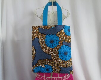 Tote bag, sac, en tissu de couleur bleu turquoise, bleu marine, ocre et blanc à motif africain