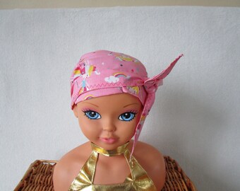 Foulard, turban chimio enfant de couleur rose bonbon avec des petites fées