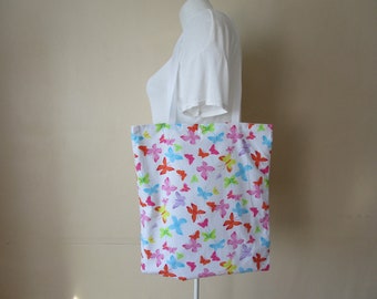 Tote bag, sac, en tissu de couleur blanche avec des papillons multicolore