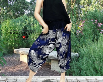 May include: Blue and white patterned pants with a wide leg and a drawstring waist. The pants feature a koi fish design.