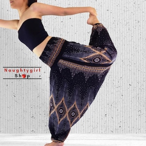 Gorgeous black harem pants come with peacock feather pattern and can be worn as pants or jumpsuits.