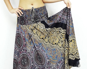 May include: A long, flowing skirt with a black, blue, and gold mandala print. The skirt has an elastic waistband and a drawstring tie.
