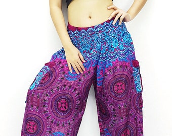 May include: Purple and blue printed pants with a mandala design. The pants are loose fitting and have a wide leg.