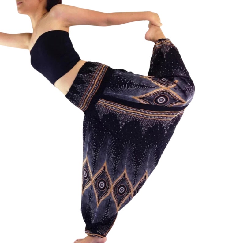 Gorgeous black harem pants come with peacock feather pattern and can be worn as pants or jumpsuits.