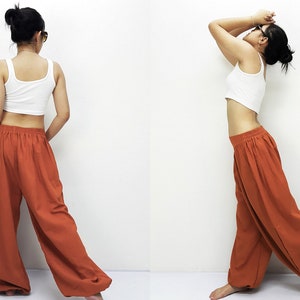 Gorgeous burnt orange cotton pants unique design. It's a comfy trousers and have many color to choose !!