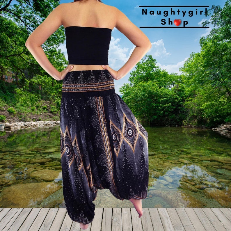 Gorgeous black harem pants come with peacock feather pattern and can be worn as pants or jumpsuits.