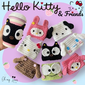 May include: A set of nine crocheted Hello Kitty and Friends coffee cup cozies. The cozies are in various colors and feature different characters, including Hello Kitty, My Melody, and Keroppi. The cozies are all handmade and feature cute details like embroidered eyes and noses.