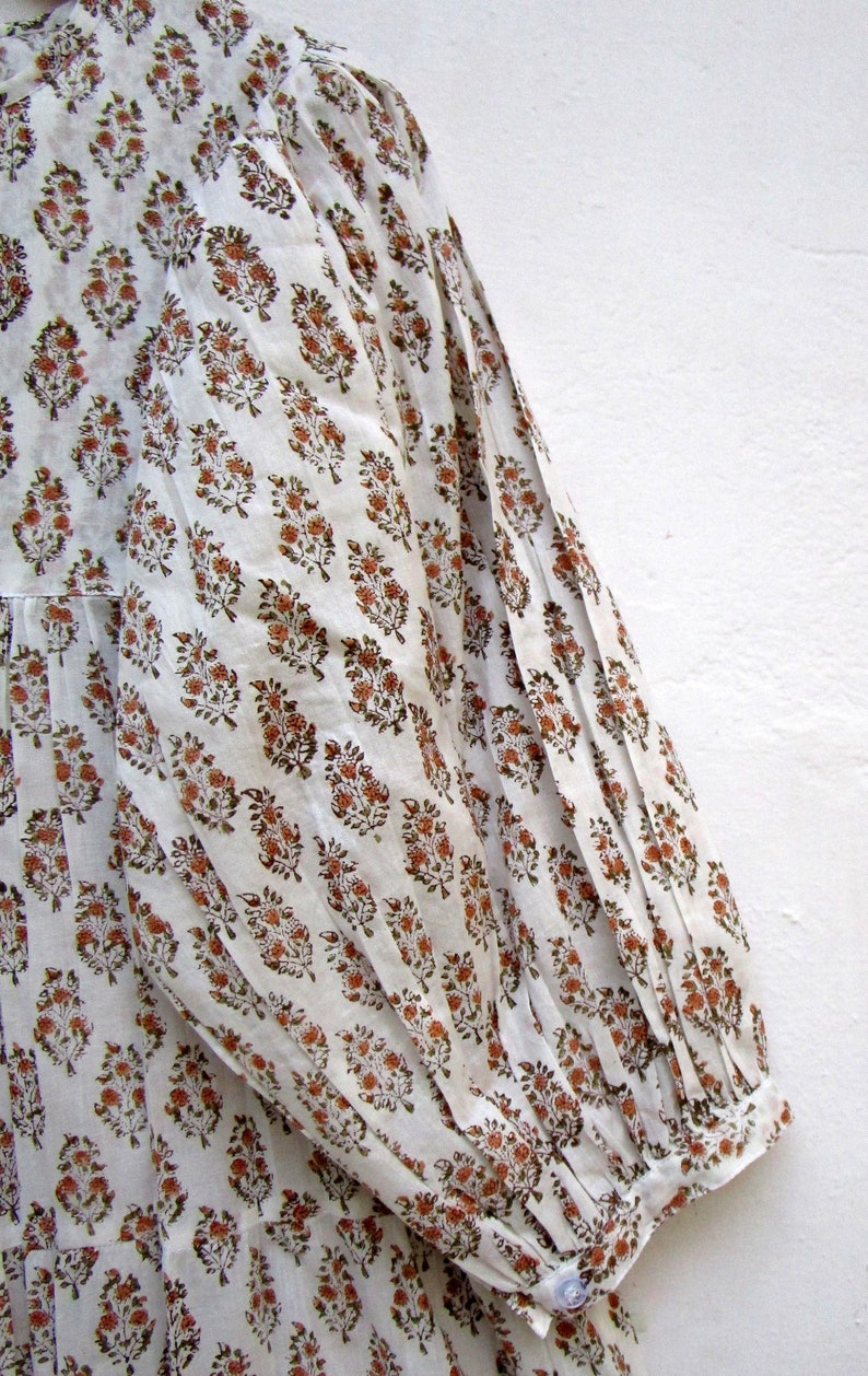 round neckline with ties mini maxi dress 34th sleeve with buttons mini maxi dress vintage off white plant printed mini maxi dress