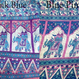 May include: A close-up of two fabric swatches with an Indian-inspired design featuring elephants, arches, and floral patterns. The swatches are labeled "Pink Blue" and "Blue Pink".