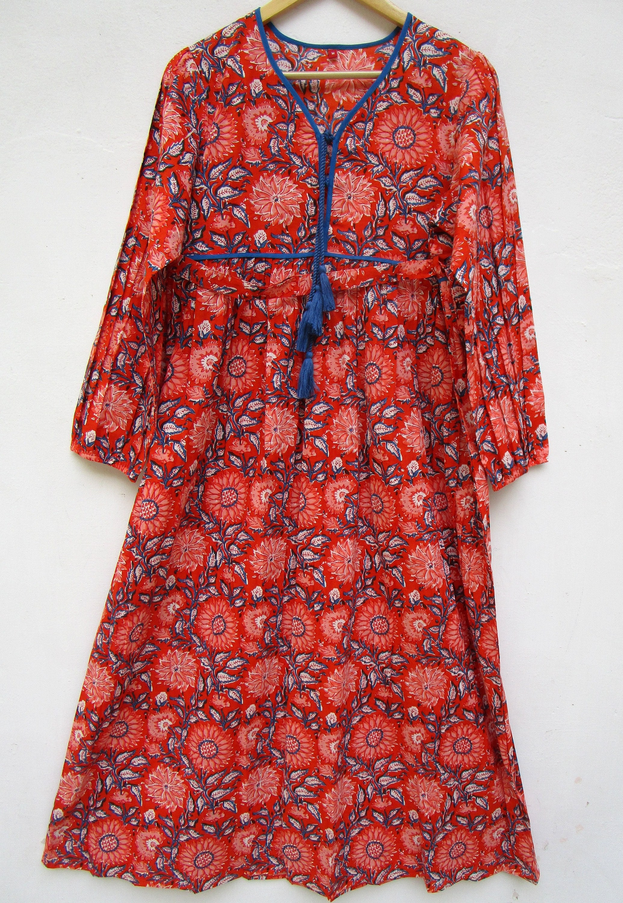 navy dress with orange flowers