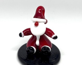 Babbo Natale seduto . In vetro di Murano lavorato a lume.