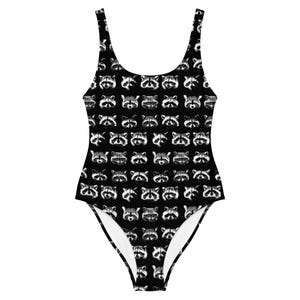 May include: Black one-piece swimsuit with a white raccoon pattern.