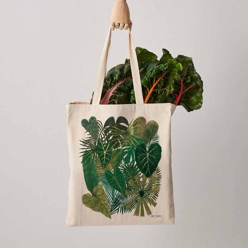 High quality and durable fair trade natural canvas tote bag featuring a vibrant leafy green botanical pint.