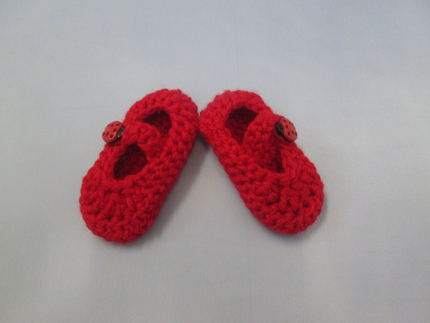 red baby booties