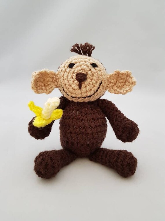 monkey with a banana toy